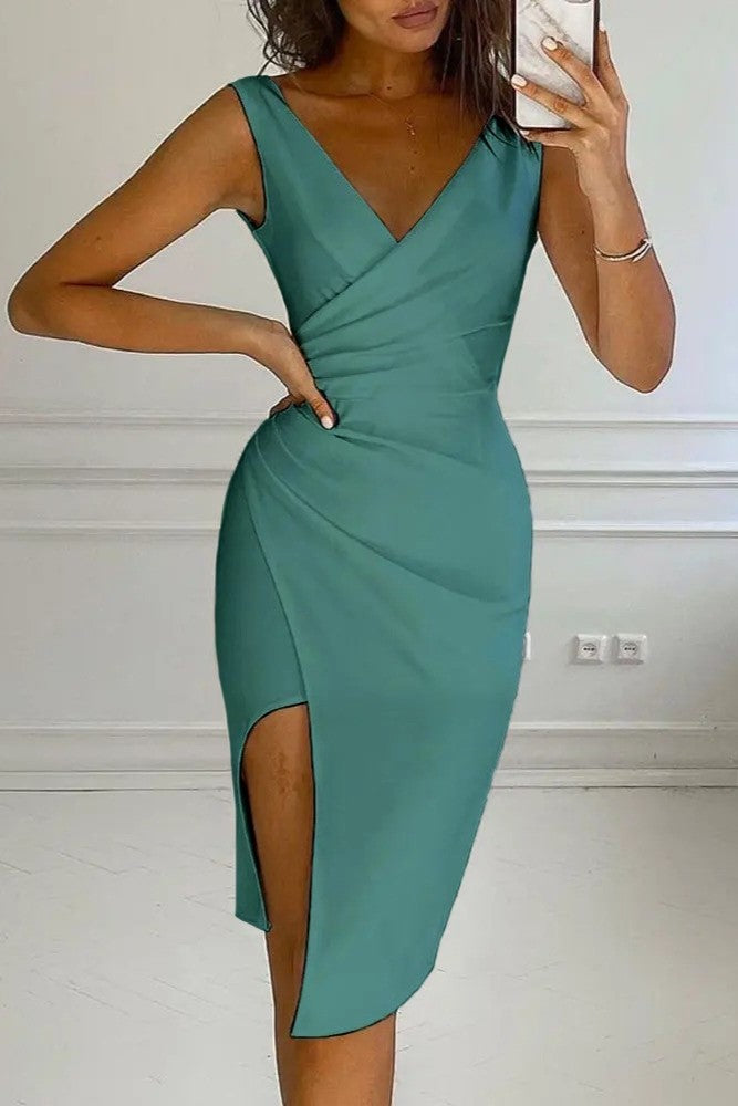 Elegant mint mini dress Gerata featuring a deep V neckline, wide straps, and knee-length skirt with slit, made in Italy.