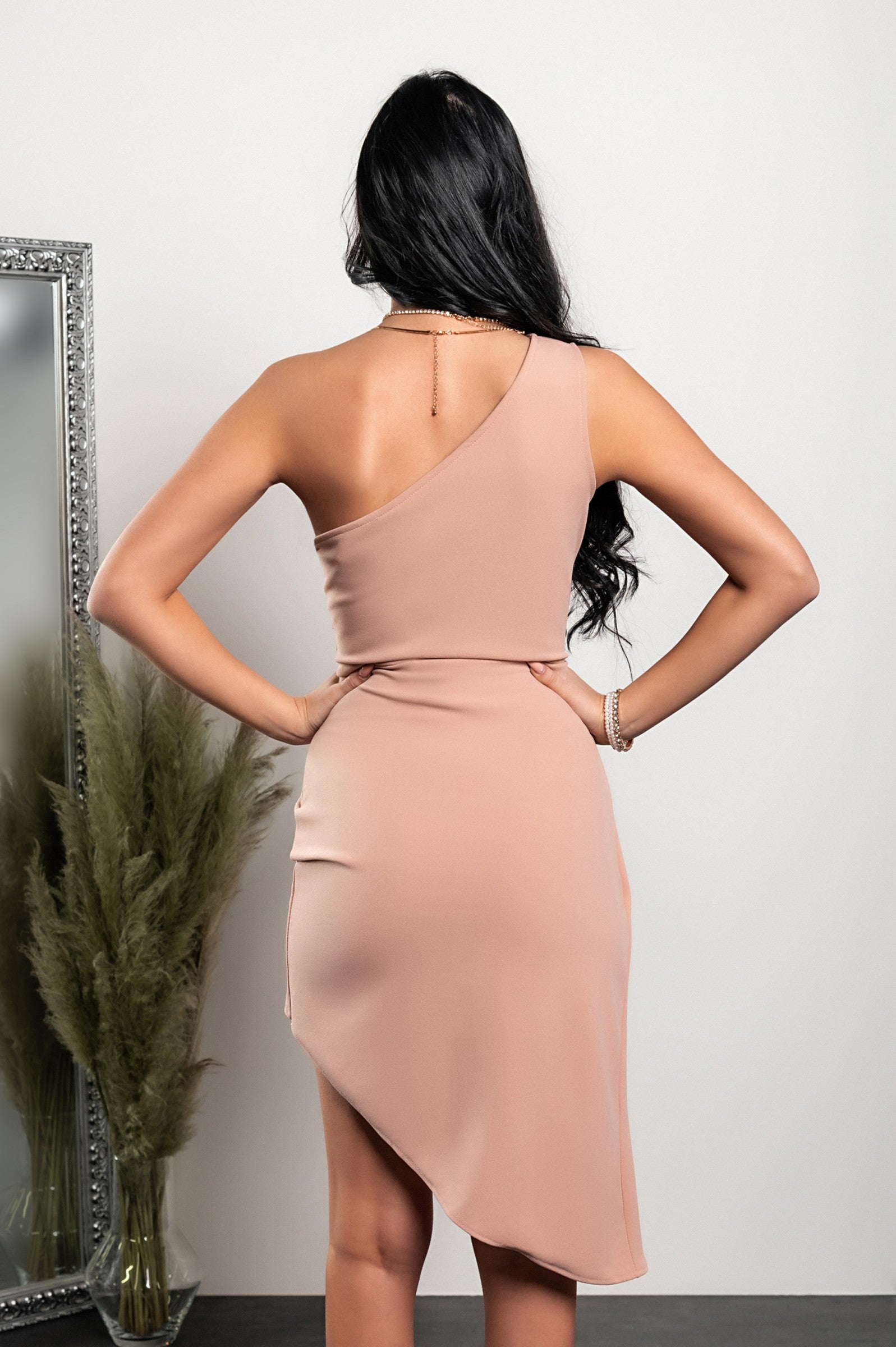 Elegant light pink mini dress Marettima with asymmetrical cut and neckline, showcasing a stylish design suitable for various occasions.