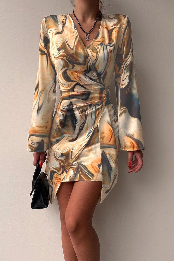 Elegant beige mini dress with print, featuring long loose sleeves and a v-neckline, perfect for various occasions.