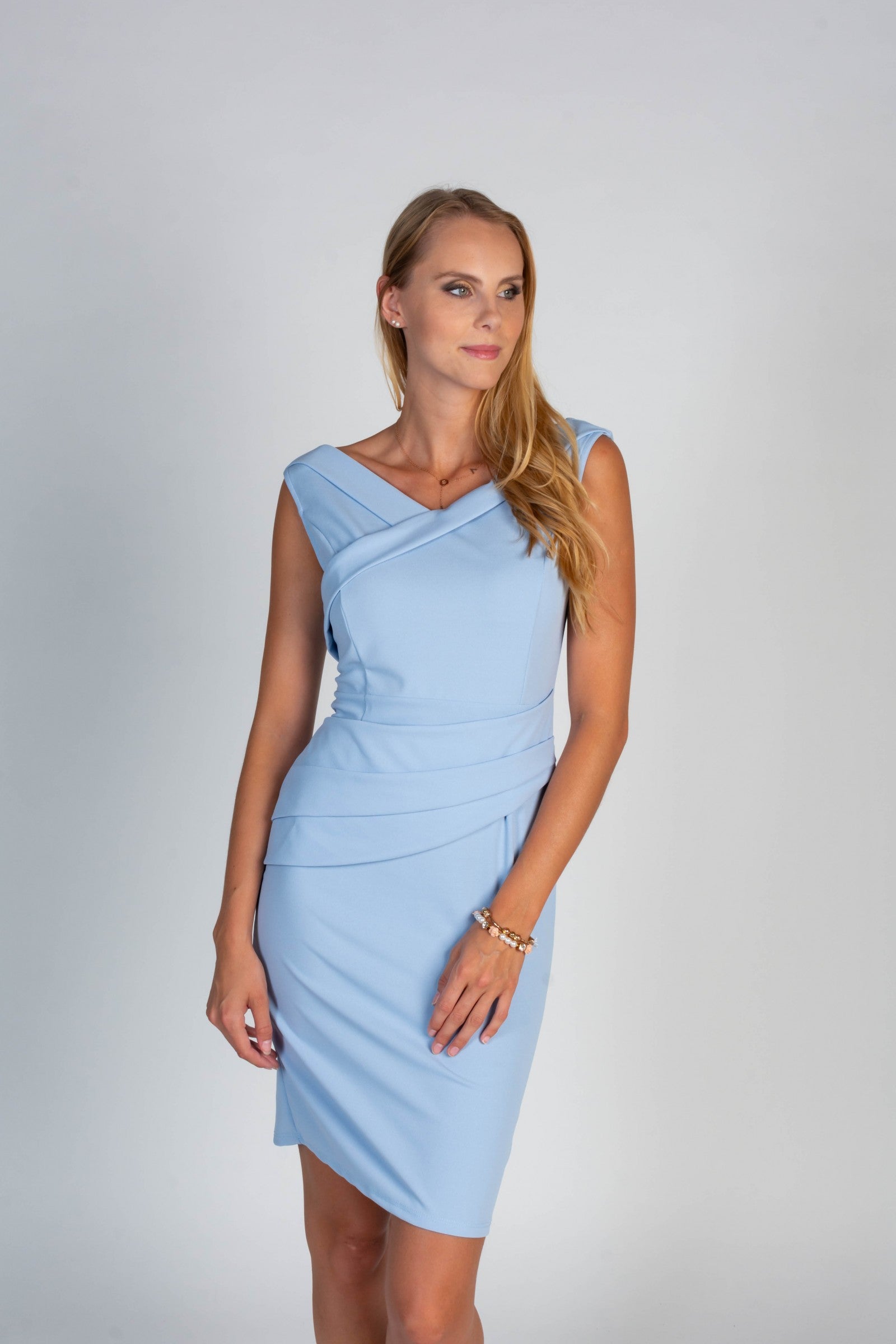 Woman in light blue dress.