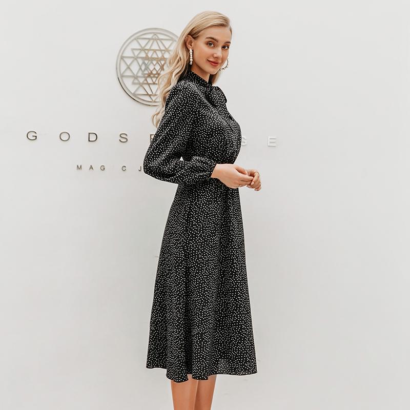 Elegant polka dot women dress featuring lantern sleeves, A-line silhouette, and bow decoration in black and camel colors.