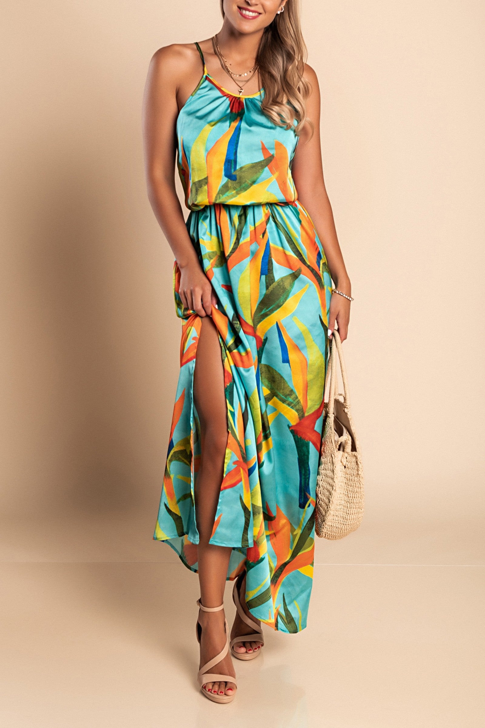 Elegant green printed maxi dress made of high-quality imitation satin, featuring a round neckline and elasticated waist.