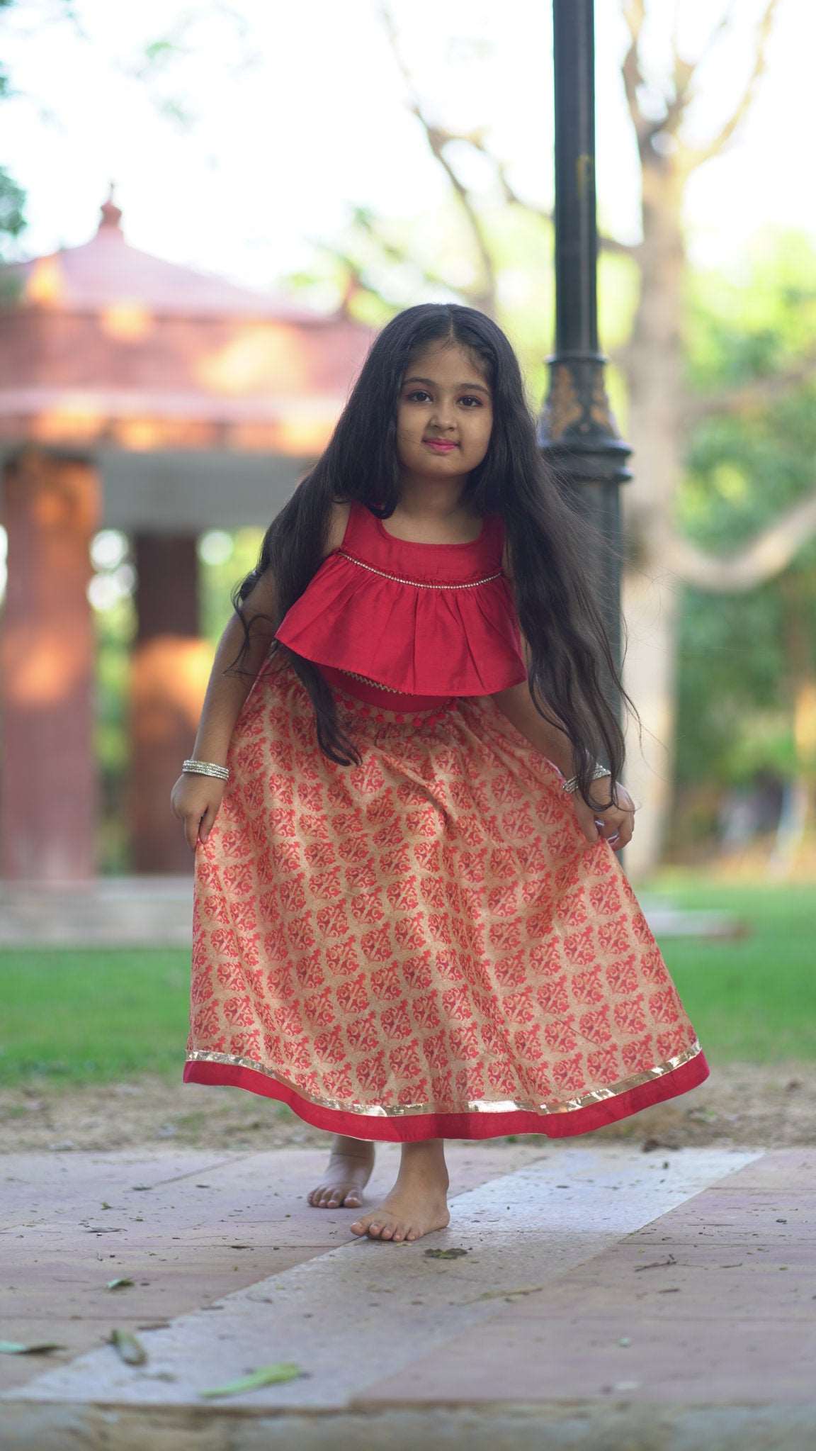 Elegant red Chanderi Lehenga Choli kids set featuring a soft fabric, relaxed fit lehenga, stylish choli, and matching dupatta.