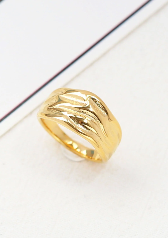 Elegant gold color stainless steel ring, item code ART2112, showcasing a sleek and modern design.