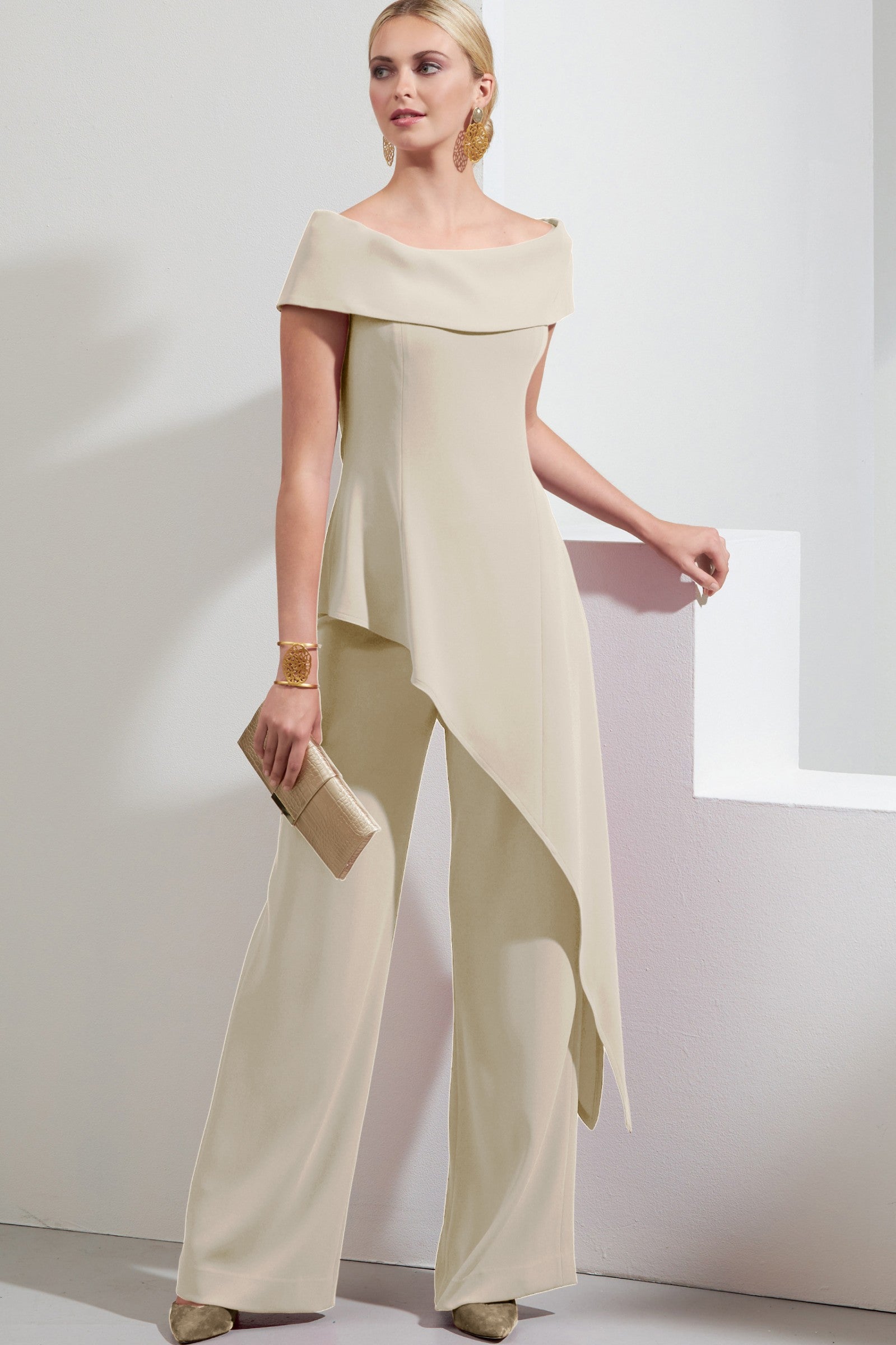 Elegant beige asymmetrical top and loose trousers set, showcasing a bateau neckline and elastic waist for comfort.