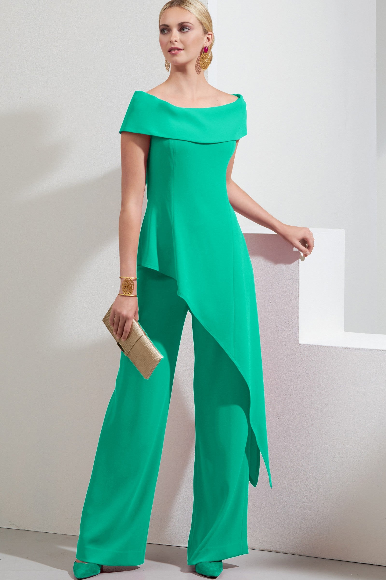 Elegant mint asymmetrical top and loose trousers set, showcasing a bateau neckline and elastic waist for comfort.