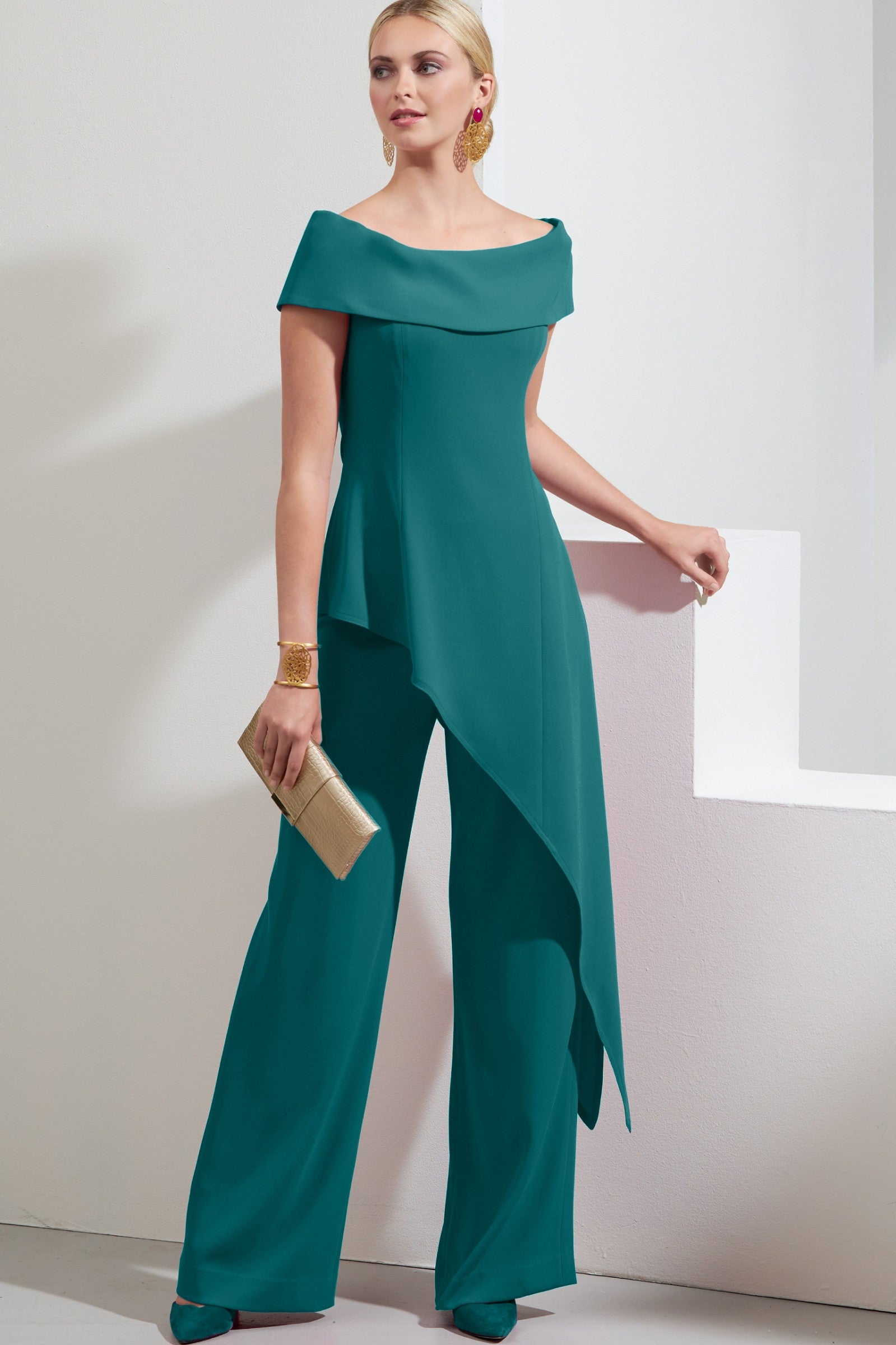 Elegant petrol-colored asymmetrical top and loose pants set, showcasing a bateau neckline and elastic waist design.