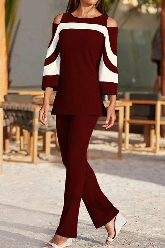 Elegant burgundy top and pants set featuring off-the-shoulder neckline and 3/4 bell sleeves, made from soft, high-quality fabric.