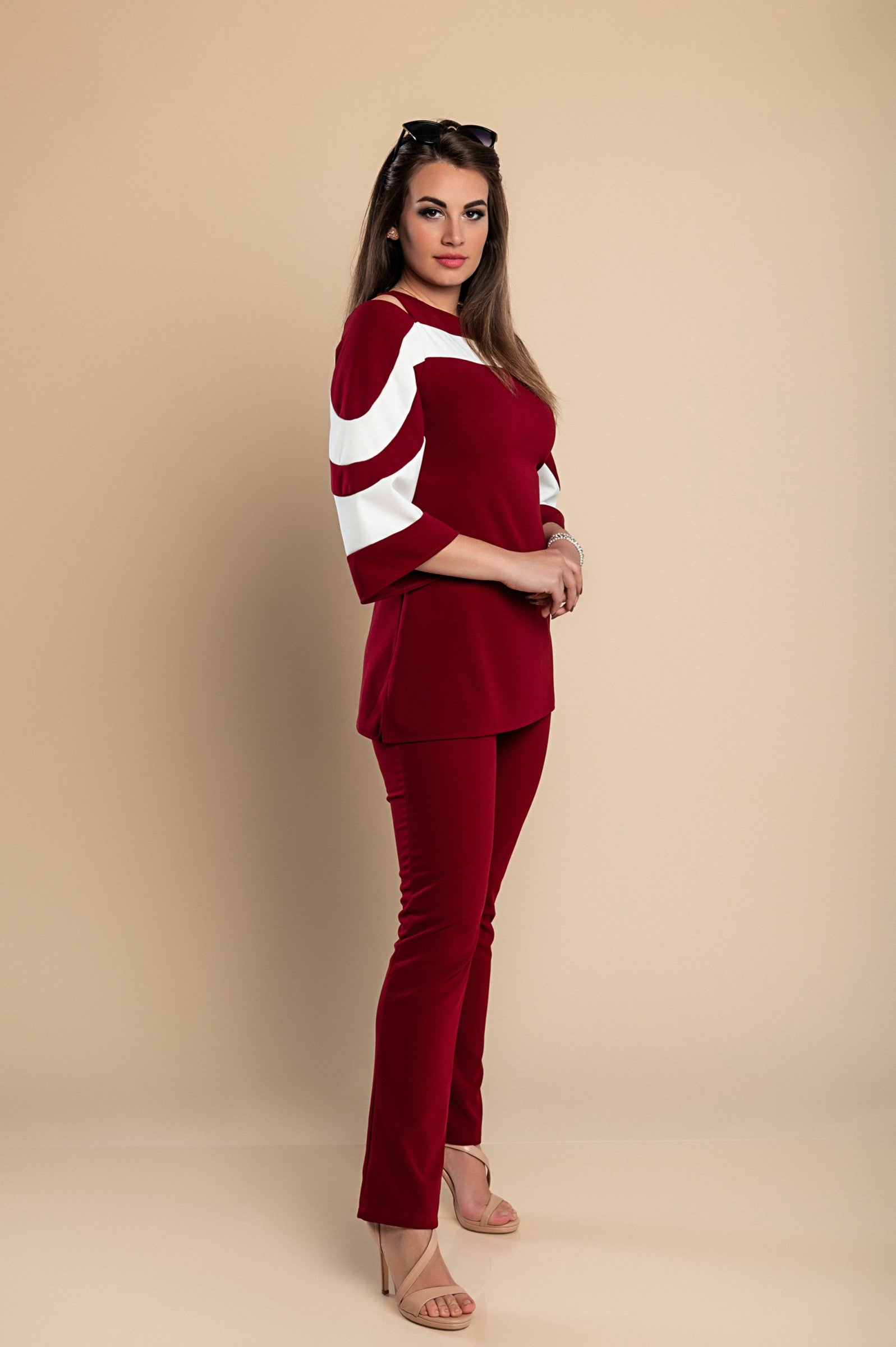 Elegant burgundy top and pants set featuring off-the-shoulder neckline and 3/4 bell sleeves, made from soft, high-quality fabric.