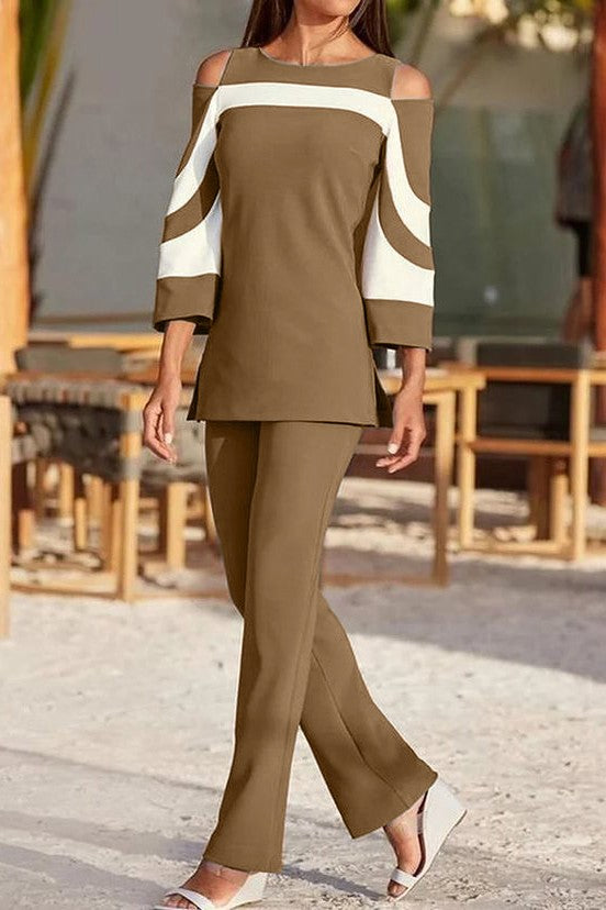 Elegant camel top and pants set featuring a two-color design, off-the-shoulder neckline, and 3/4 bell sleeves, made in Italy.