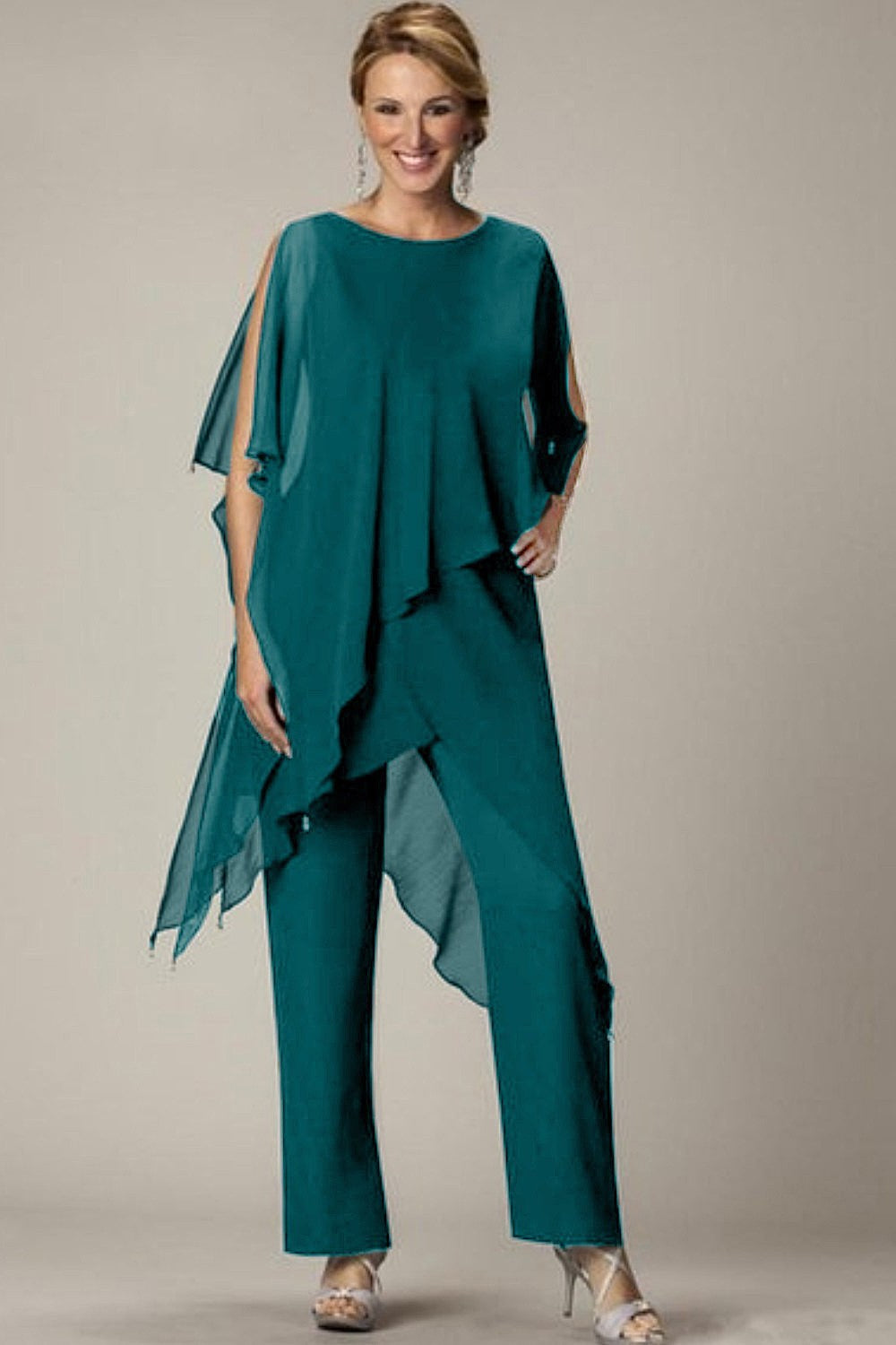 Elegant sheer tunic and long pant set in petrol color, showcasing a loose fit and round neckline, made from high-quality fabric.