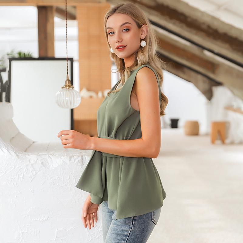 Elegant solid green sleeveless tank top for women, featuring stylish sashes and a casual design, perfect for versatile outfits.