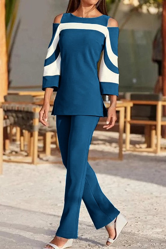 Elegant petrol top and pants set featuring a two-color design, off-the-shoulder neckline, and 3/4 bell sleeves, made in Italy.