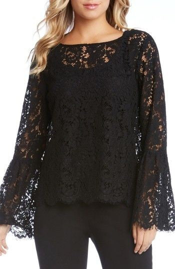 Elegant black transparent lace blouse with long sleeves and round neckline, showcasing delicate lace details.