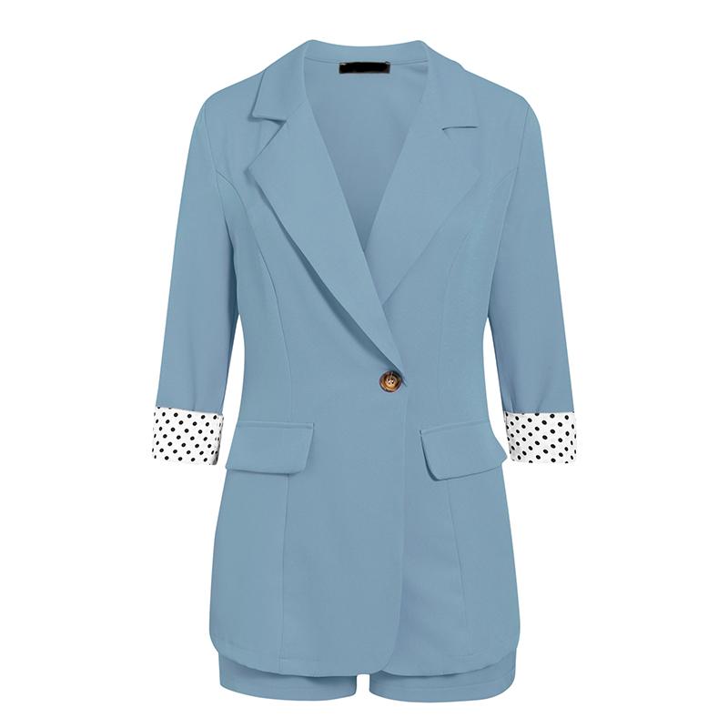 Elegant two-piece women blazer suit featuring polka dots, single button closure, and button pockets, ideal for office wear.