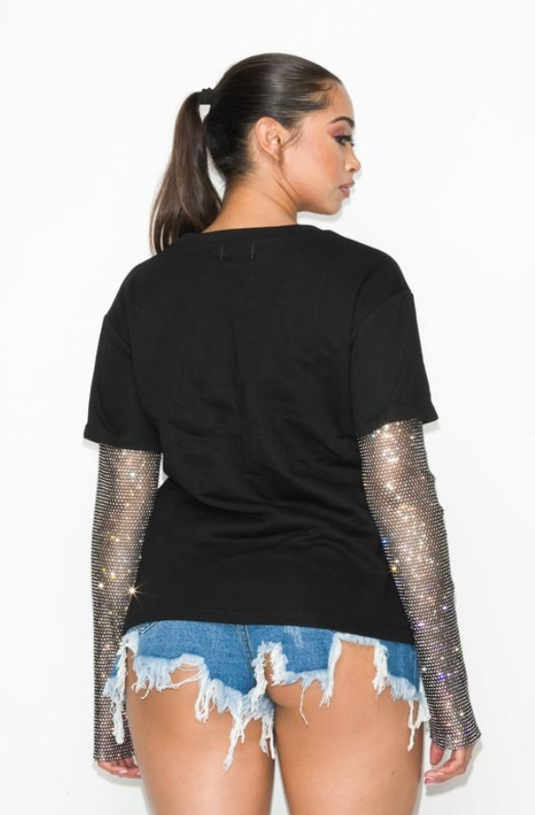 Elena Sequin Sleeve T-Shirt showcasing sparkling sequin details on the sleeves, made from soft 100% cotton fabric.