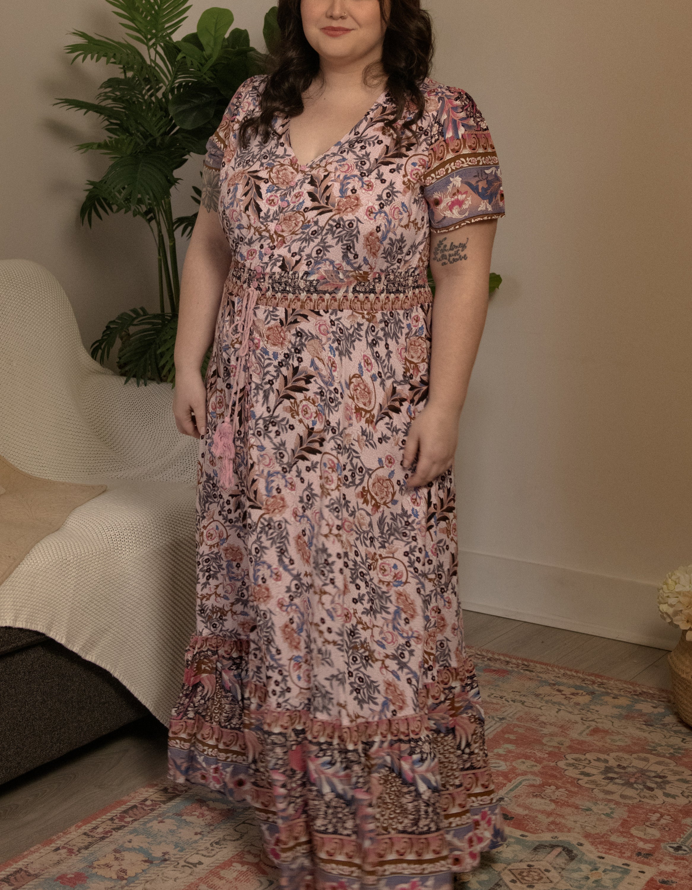 Elise Maxi Dress featuring a vintage floral bohemian print in pink and blue hues, with a V-neckline and short sleeves.