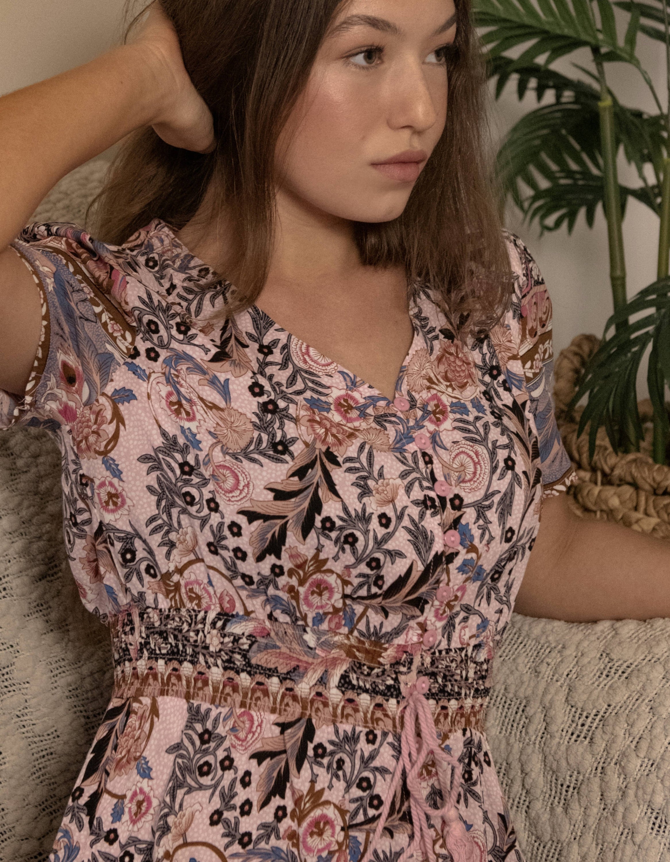 Elise Maxi Dress featuring a vintage floral bohemian print in pink and blue hues, with a V-neckline and short sleeves.