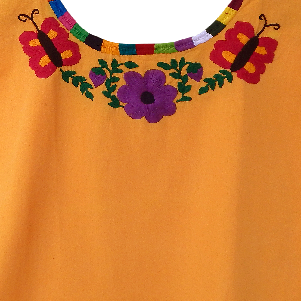 Embroidered blouse featuring colorful floral designs, handcrafted by Mexican artisans from Oaxaca, made of soft cotton fabric.