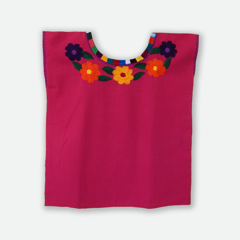 Embroidered blouse featuring colorful floral designs, handcrafted by Mexican artisans from Oaxaca, made of soft cotton fabric.