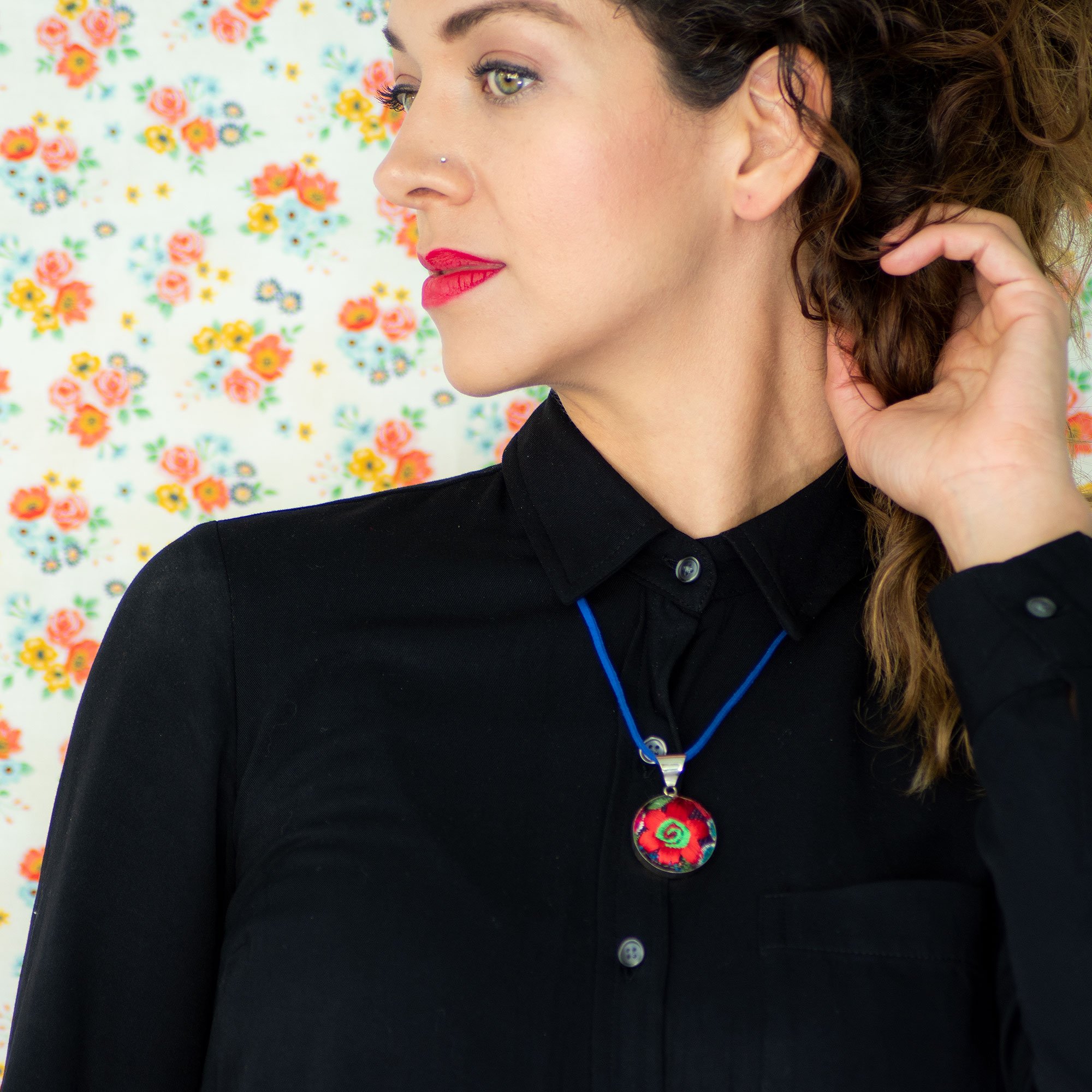 Embroidered Flower Boho Necklace featuring a vibrant floral textile pendant handcrafted in Chiapas, Mexico, showcasing intricate embroidery.