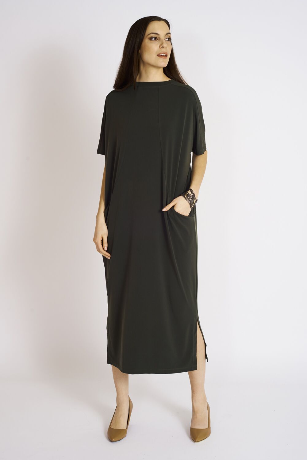 The Emmerson Dress, a stylish and versatile women's dress made from a soft polyester-spandex blend, perfect for any occasion.