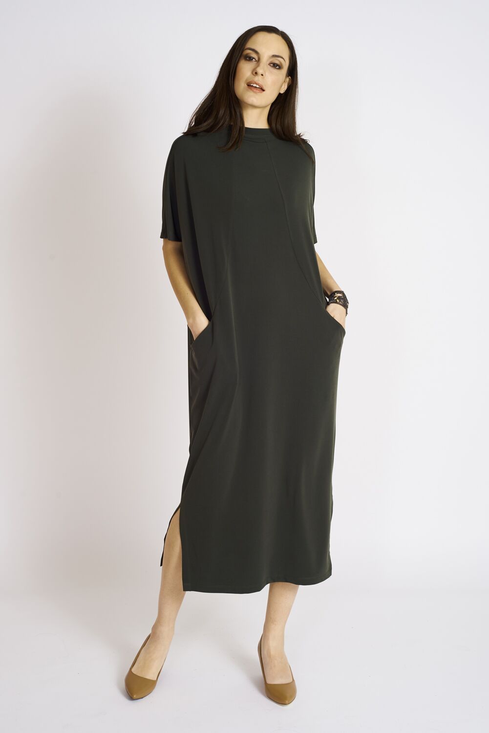 The Emmerson Dress, a stylish and versatile women's dress made from a soft polyester-spandex blend, perfect for any occasion.