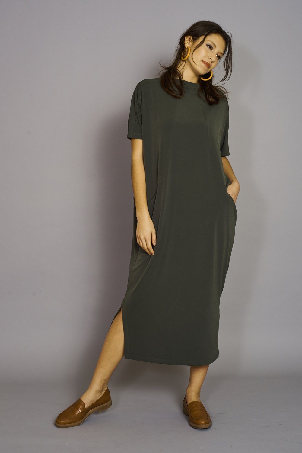 The Emmerson Dress, a stylish and versatile women's dress made from a soft polyester-spandex blend, perfect for any occasion.