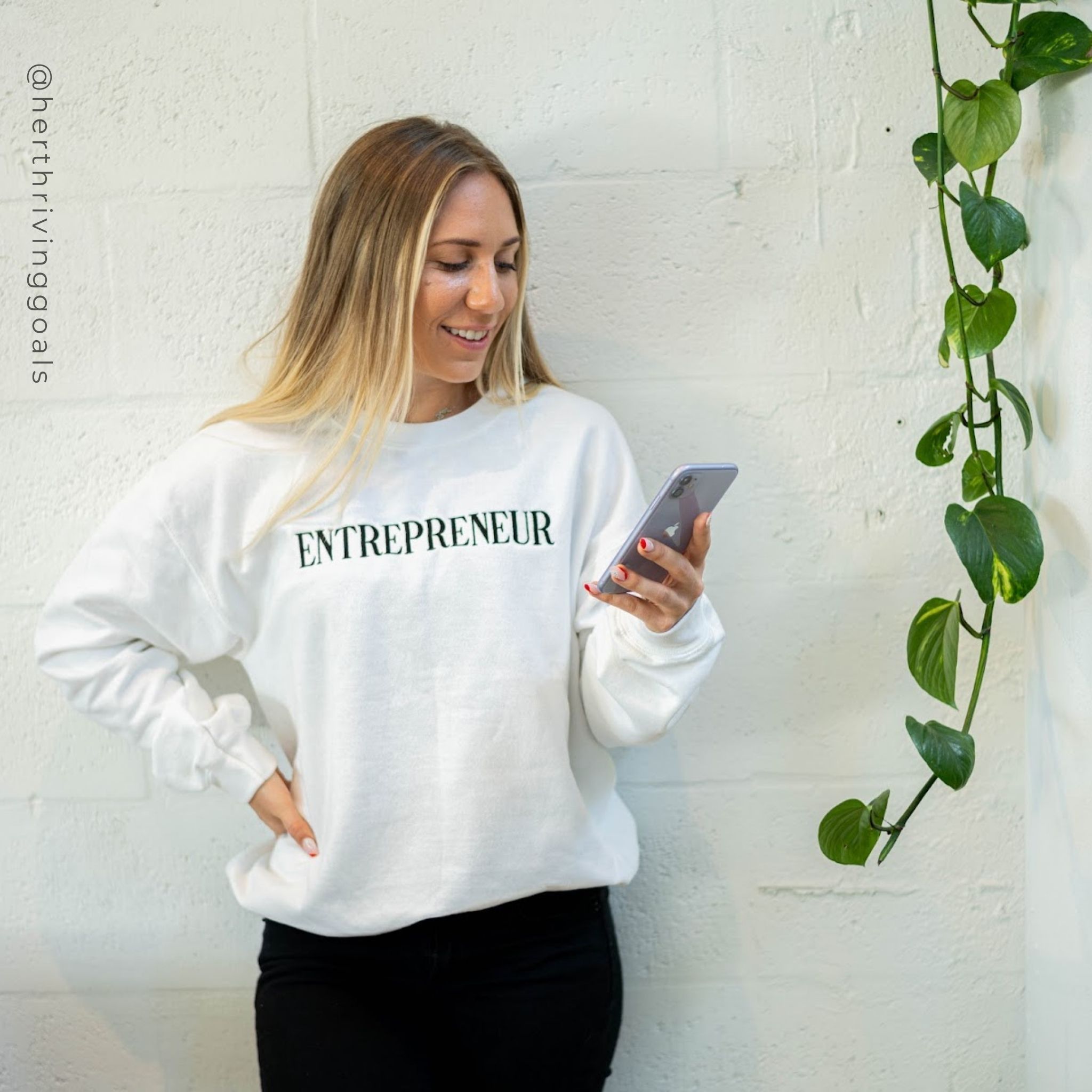 White Entrepreneur Embroidered Sweatshirt showcasing stylish embroidery and comfortable crewneck design.