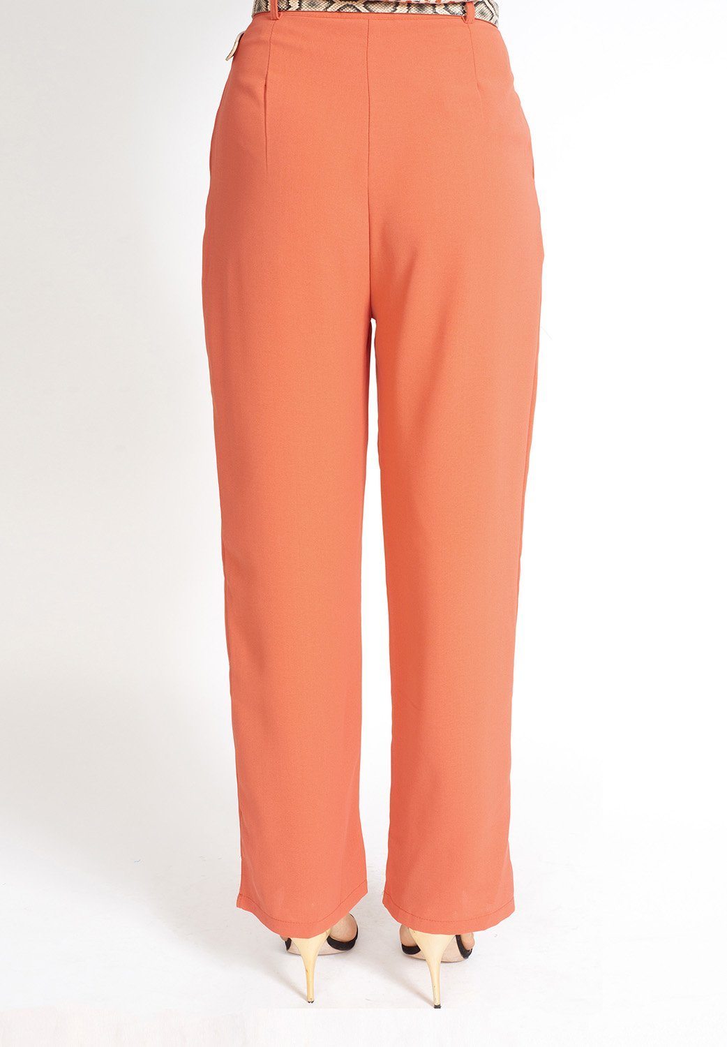 Essential High Waisted Suit Pants in a stylish setting, showcasing pleated detailing and side pockets.