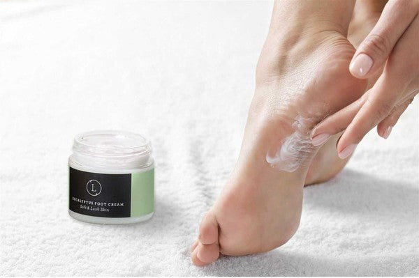 Lizush Shea Butter Eucalyptus Foot Cream in a jar, showcasing its creamy texture and natural ingredients.