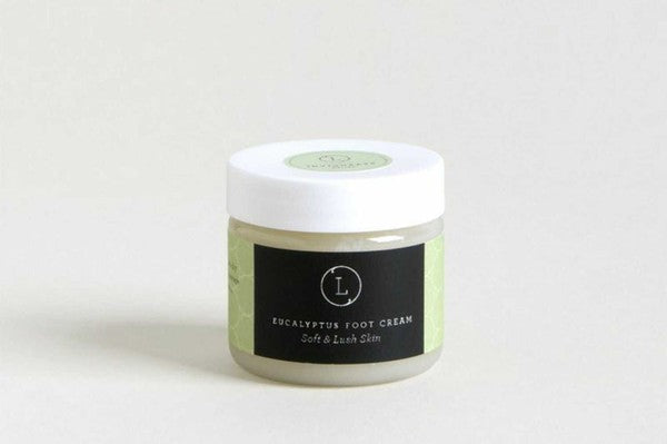 Lizush Shea Butter Eucalyptus Foot Cream in a jar, showcasing its creamy texture and natural ingredients.