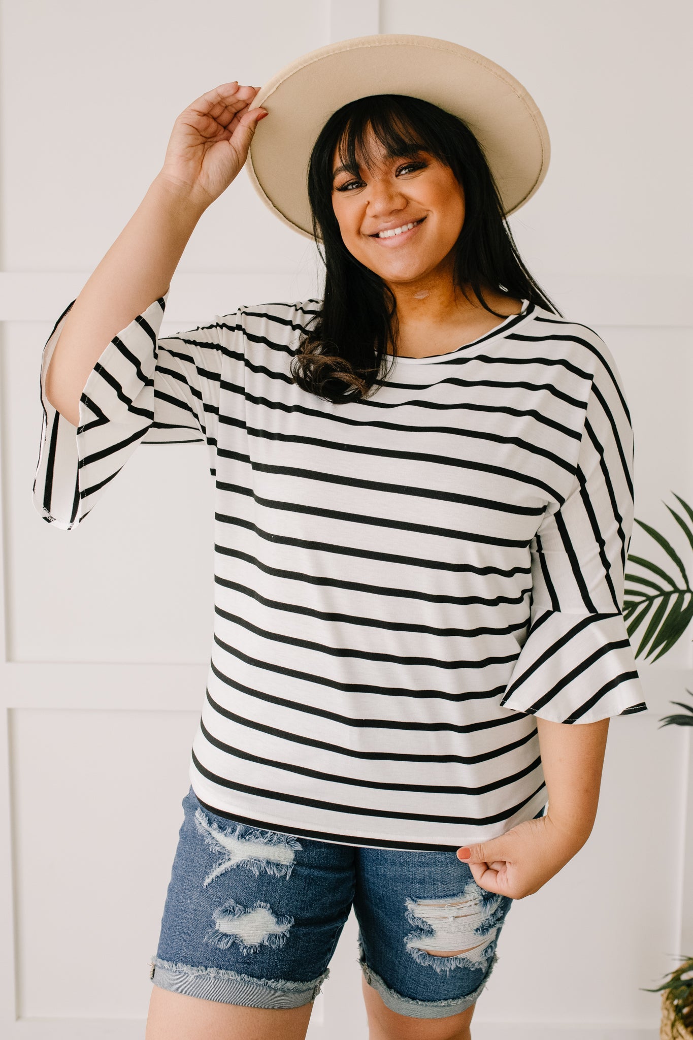 Every Direction Top in White featuring a striped design, round neckline, and bell sleeves, perfect for casual or dressy occasions.