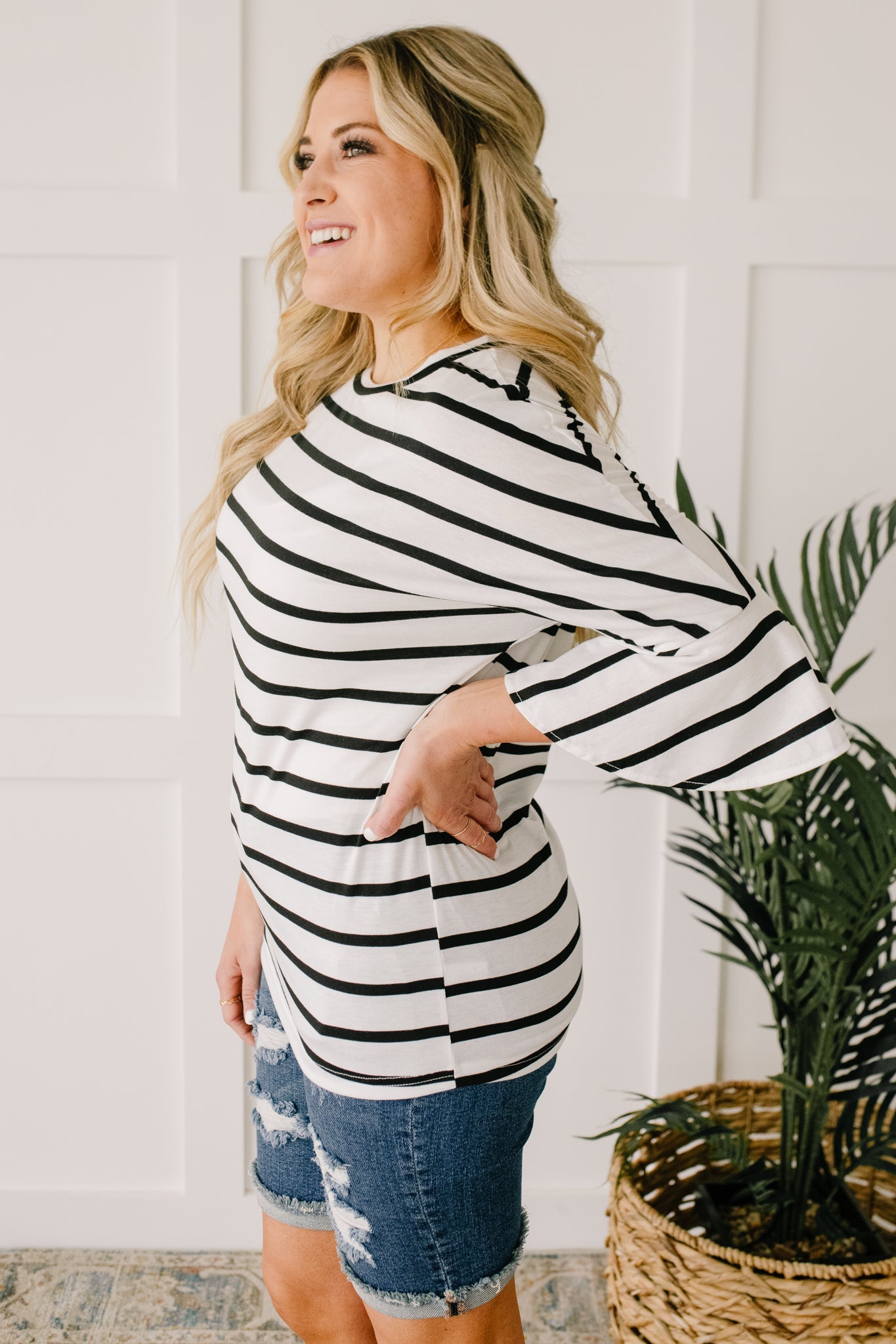 Every Direction Top in White featuring a striped design, round neckline, and bell sleeves, perfect for casual or dressy occasions.