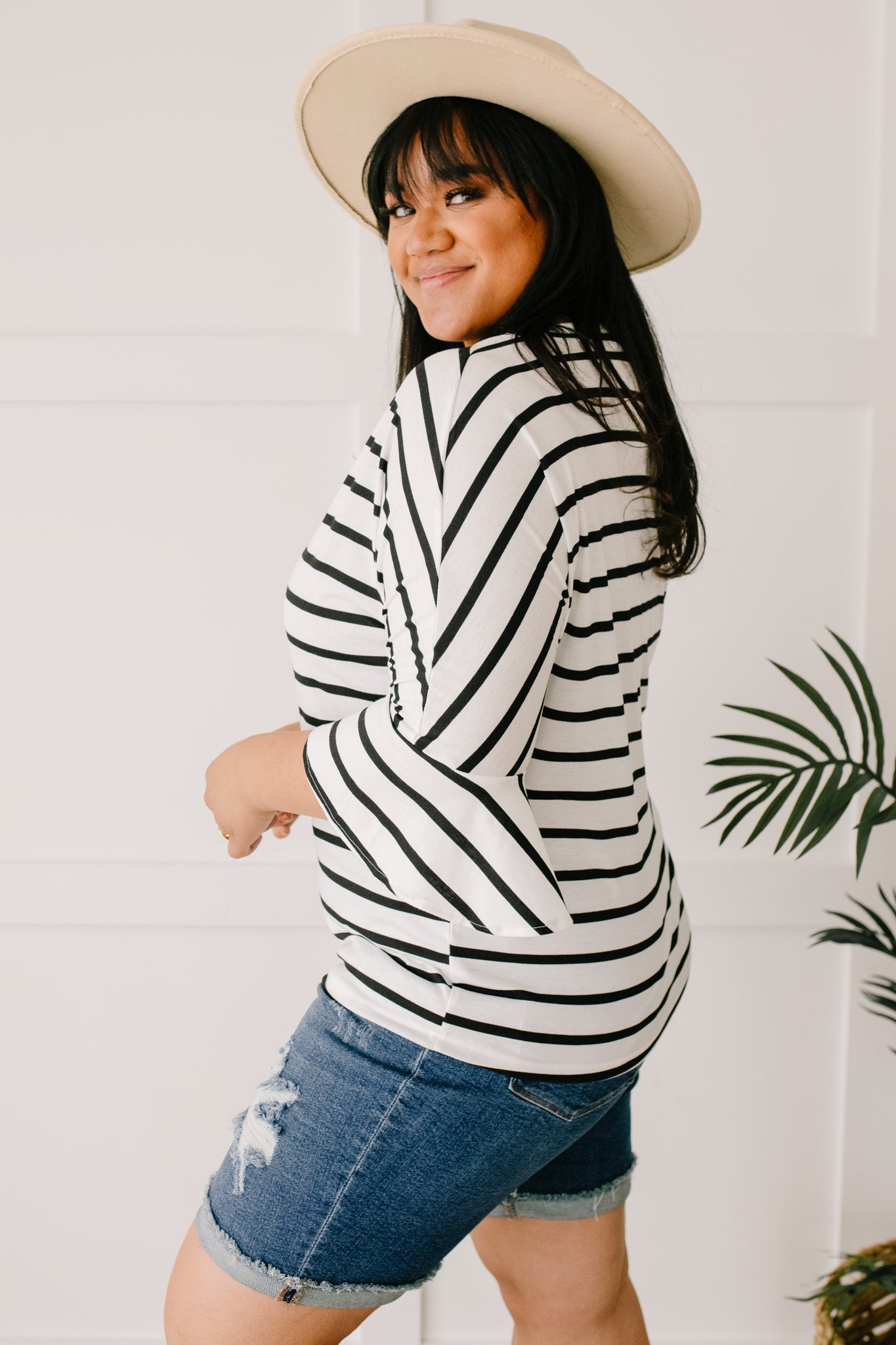 Every Direction Top in White featuring a striped design, round neckline, and bell sleeves, perfect for casual or dressy occasions.