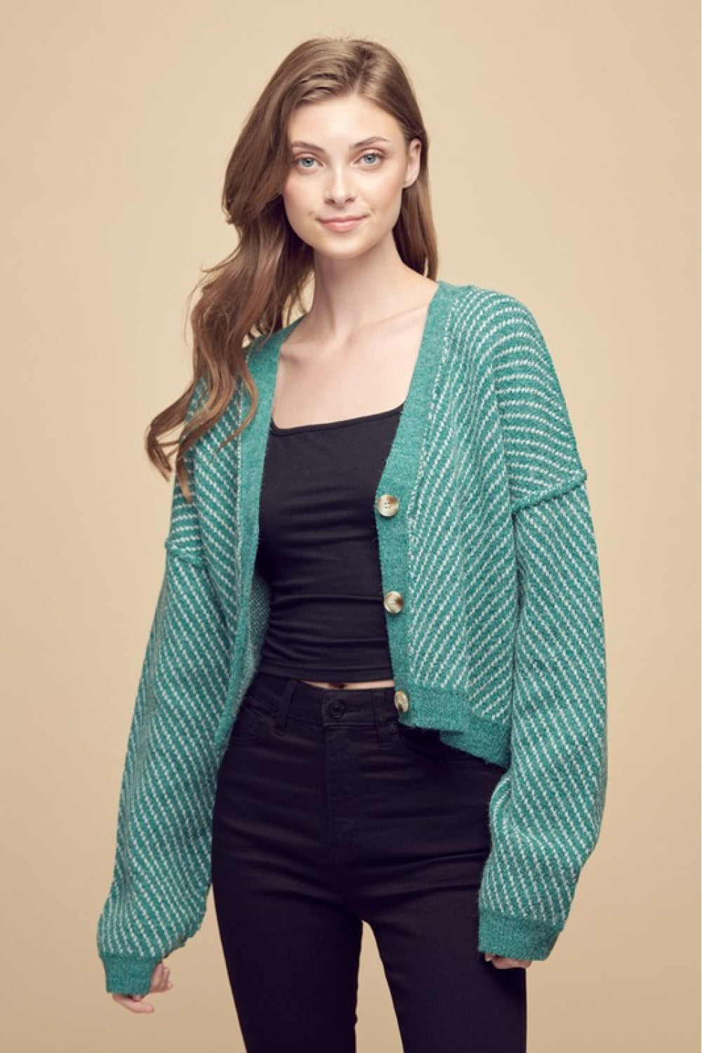 Exposed Seam Drop Shoulder Cardigan in striped pattern, featuring buttoned front and dropped shoulder sleeves, perfect for casual wear.