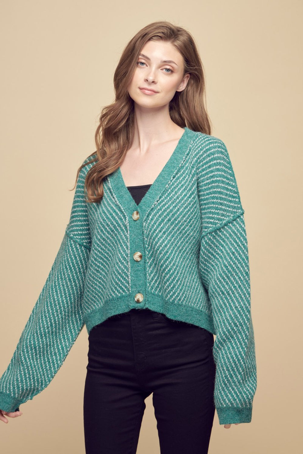 Exposed Seam Drop Shoulder Cardigan in striped pattern, featuring buttoned front and dropped shoulder sleeves, perfect for casual wear.