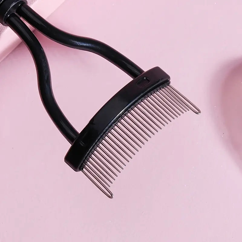 A sleek Eyelash Comb featuring metal teeth and a brush, designed for perfect lash separation and styling.