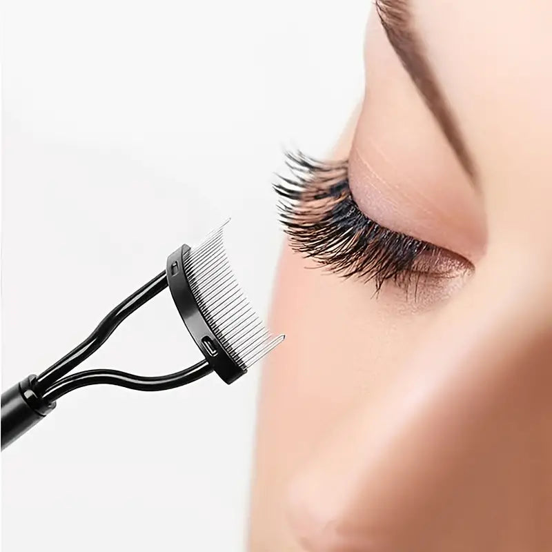 A sleek Eyelash Comb featuring metal teeth and a brush, designed for perfect lash separation and styling.