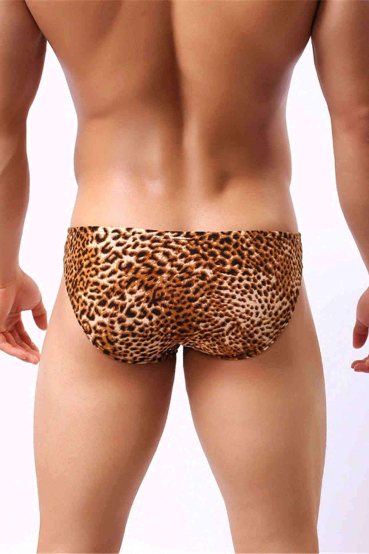 A stylish leopard print thong designed for adventurous men, featuring a bold pattern and comfortable fit.