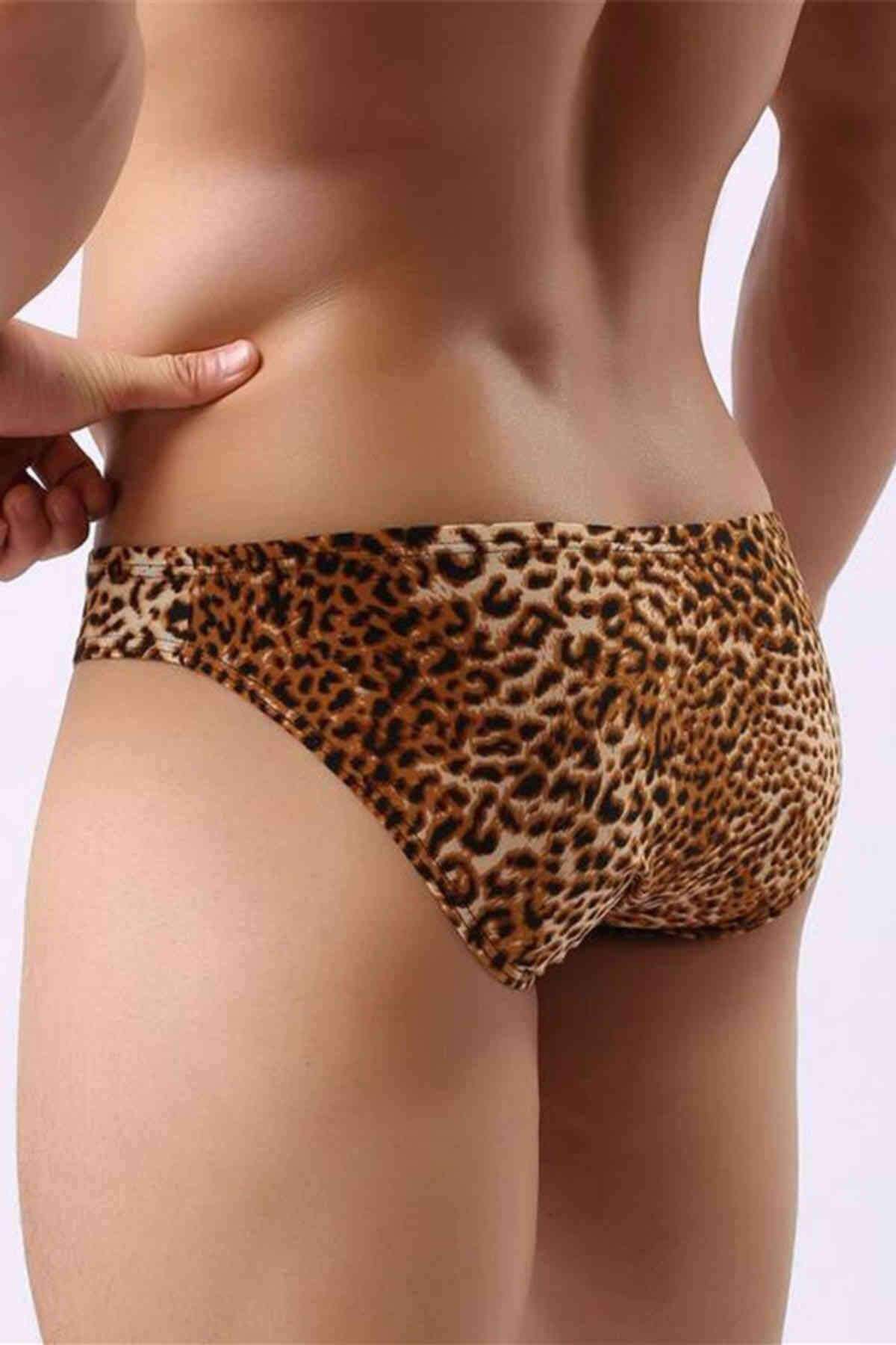 A stylish leopard print thong designed for adventurous men, featuring a bold pattern and comfortable fit.