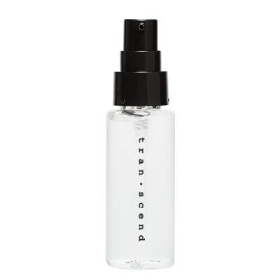 A bottle of Face Primer infused with semi-precious gems, showcasing its elegant design and lightweight formula.