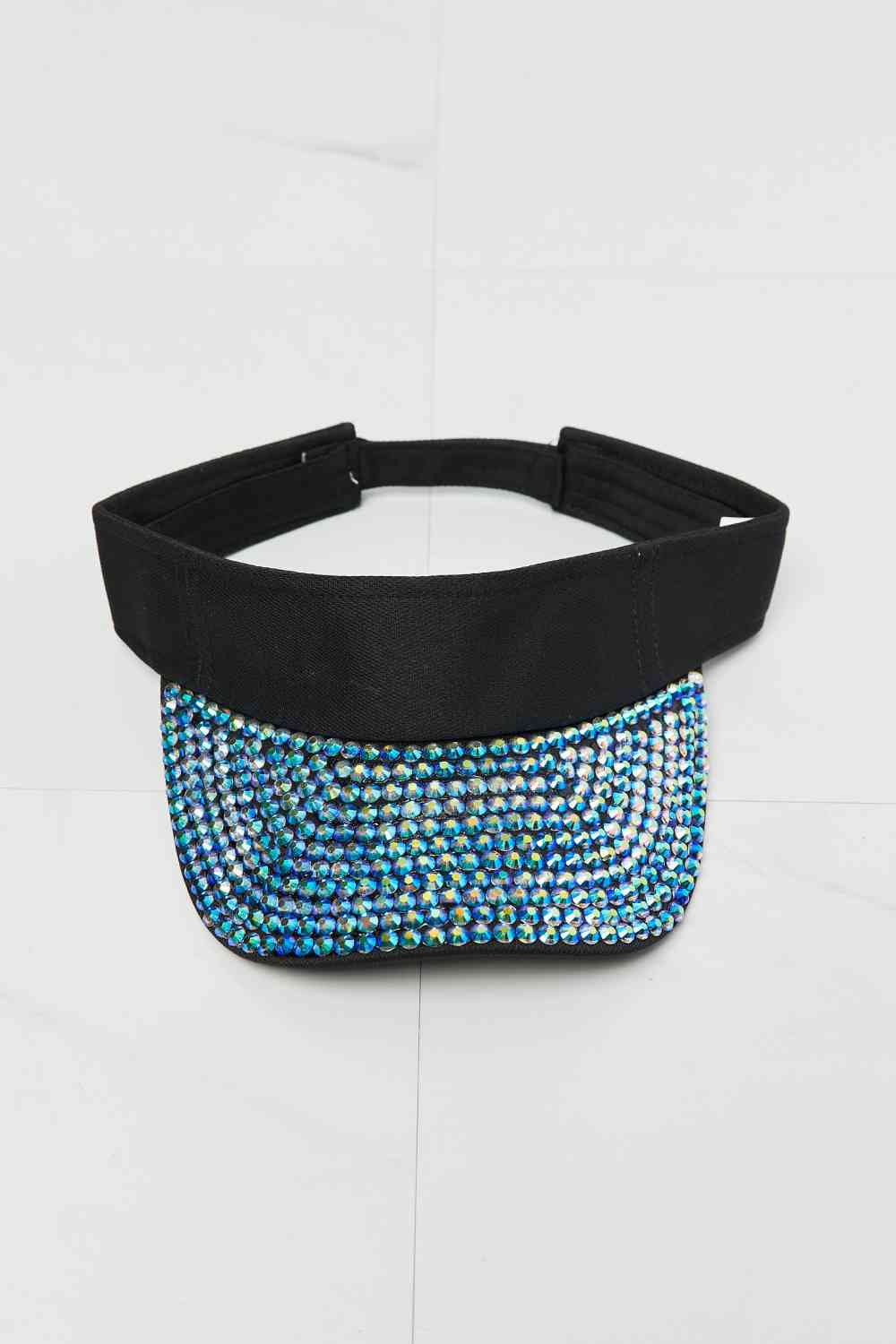 Fame Make It Sparkle Visor Hat with rhinestone rim, black color, adjustable strap, perfect for outdoor fashion.