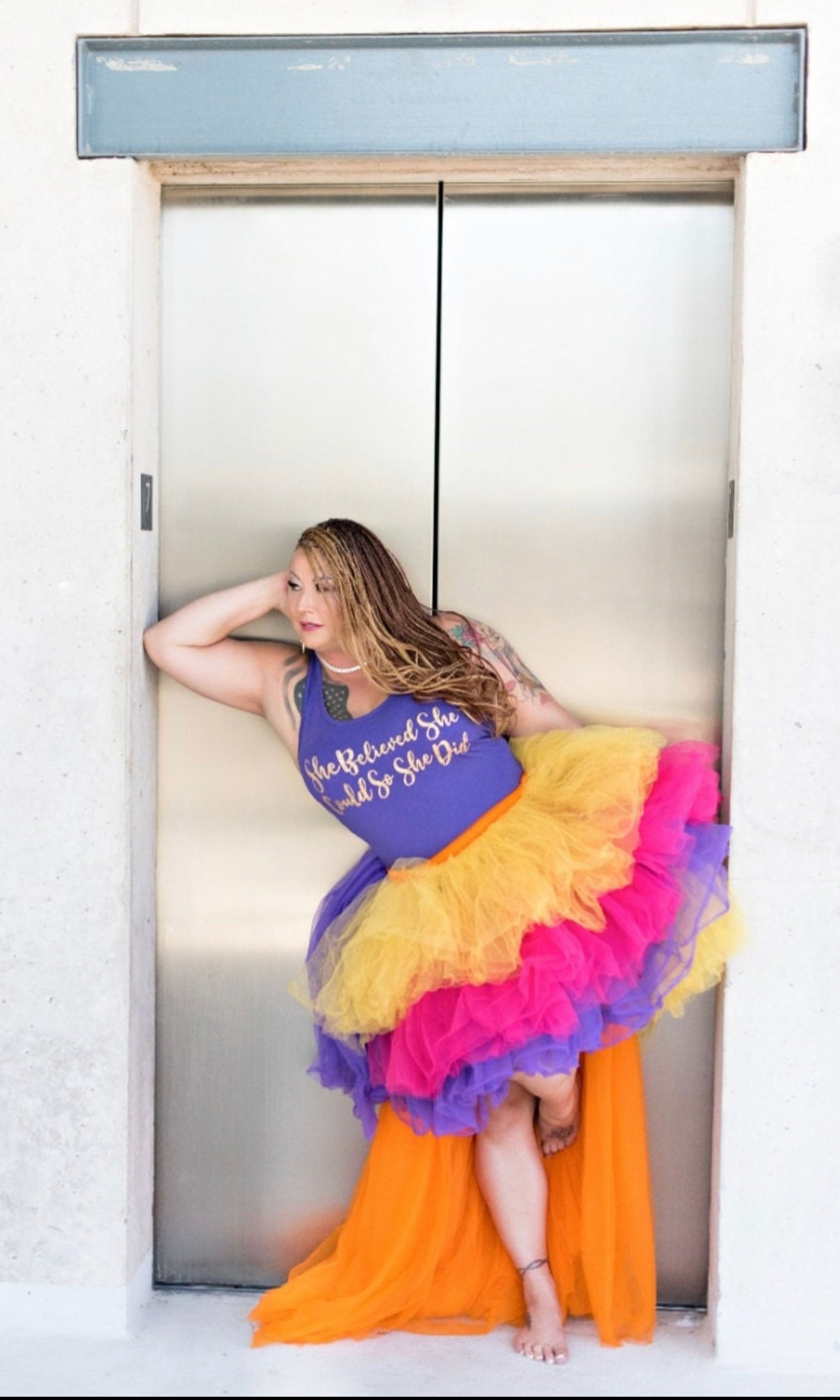 A vibrant multicolored Fantasy Skirt displayed elegantly, showcasing its versatility as both a skirt and a dress.