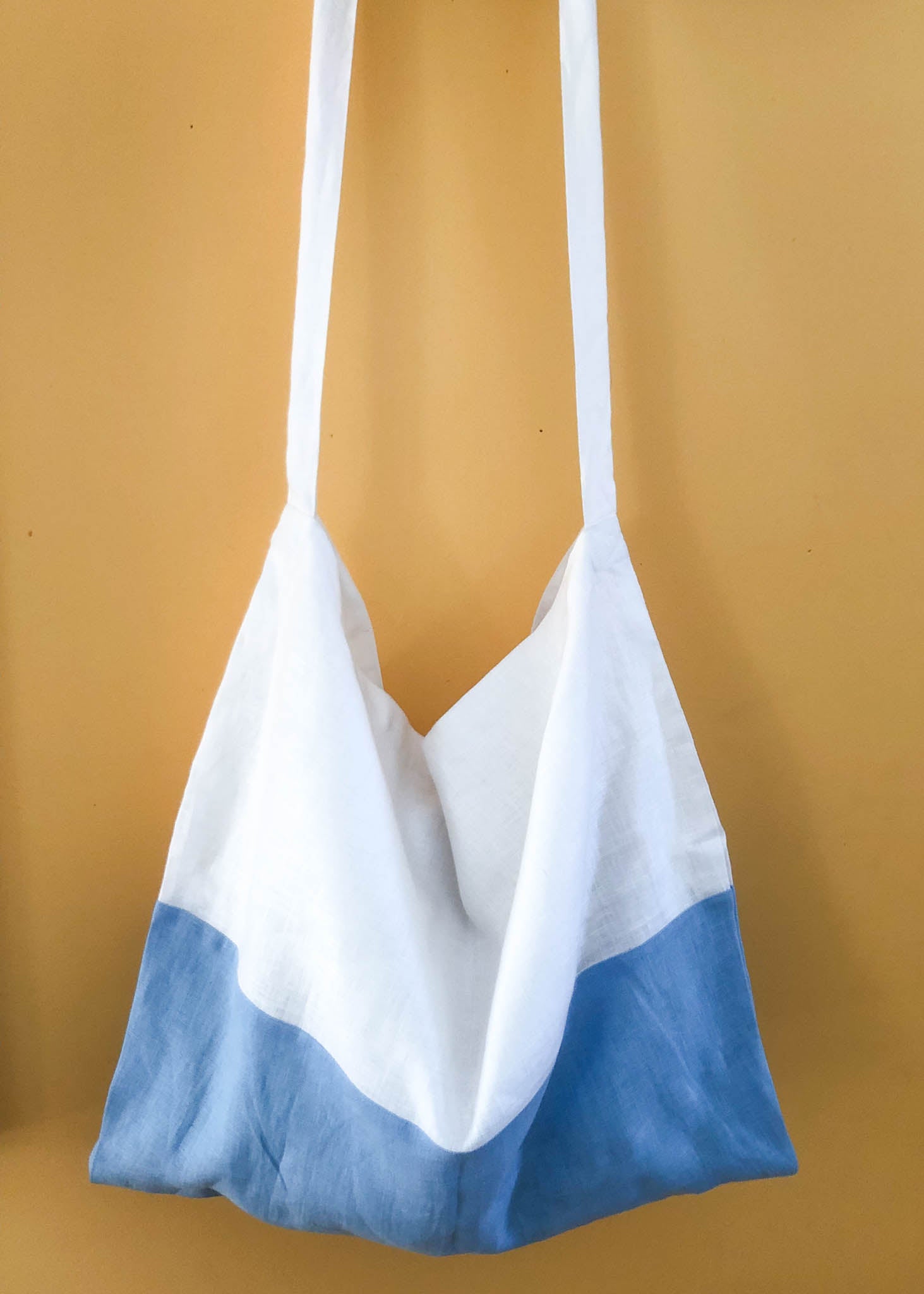 Farmers Market Bag in White & Sky Linen, showcasing its color block design and organic fabric.