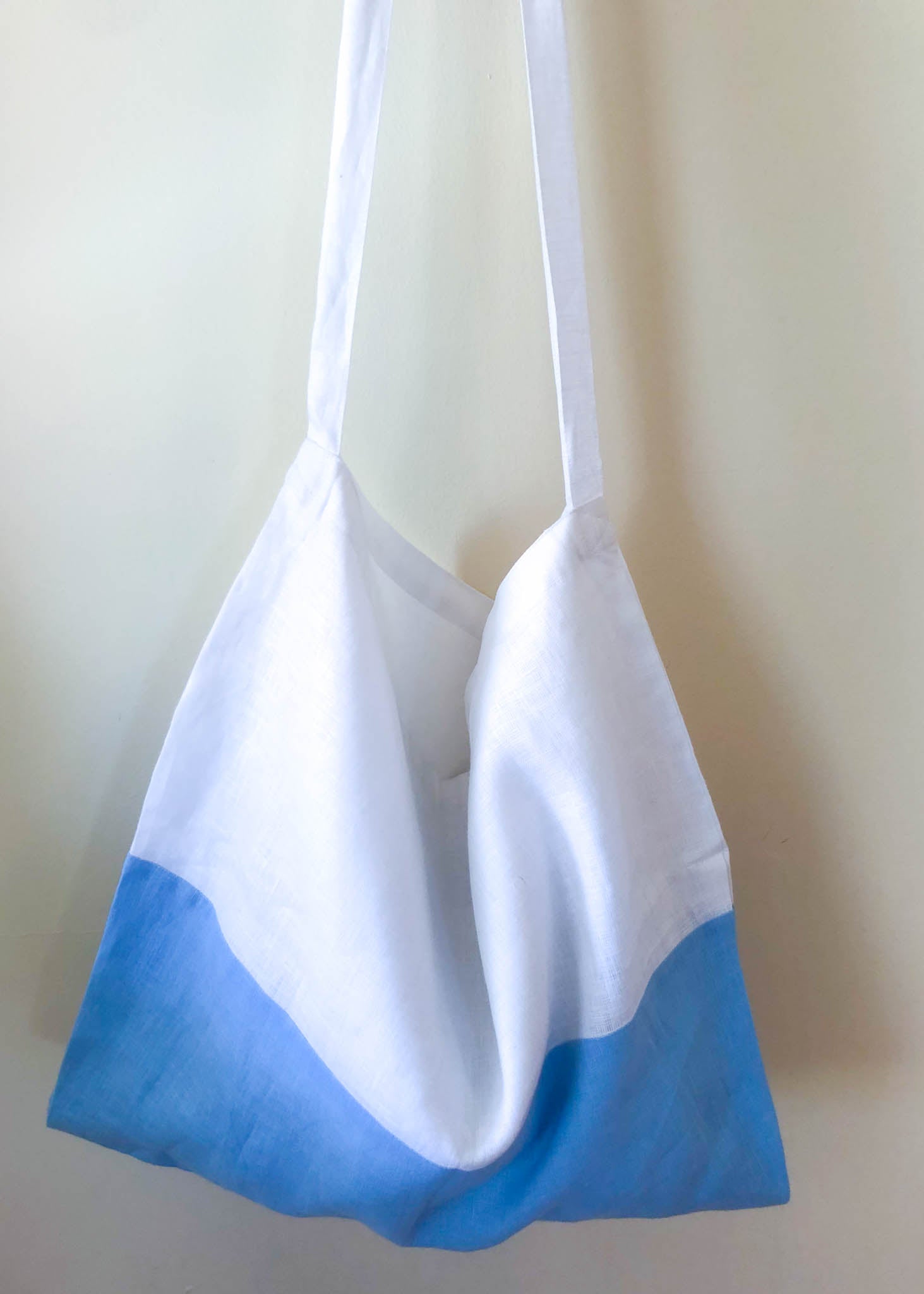 Farmers Market Bag in White & Sky Linen, showcasing its color block design and organic fabric.