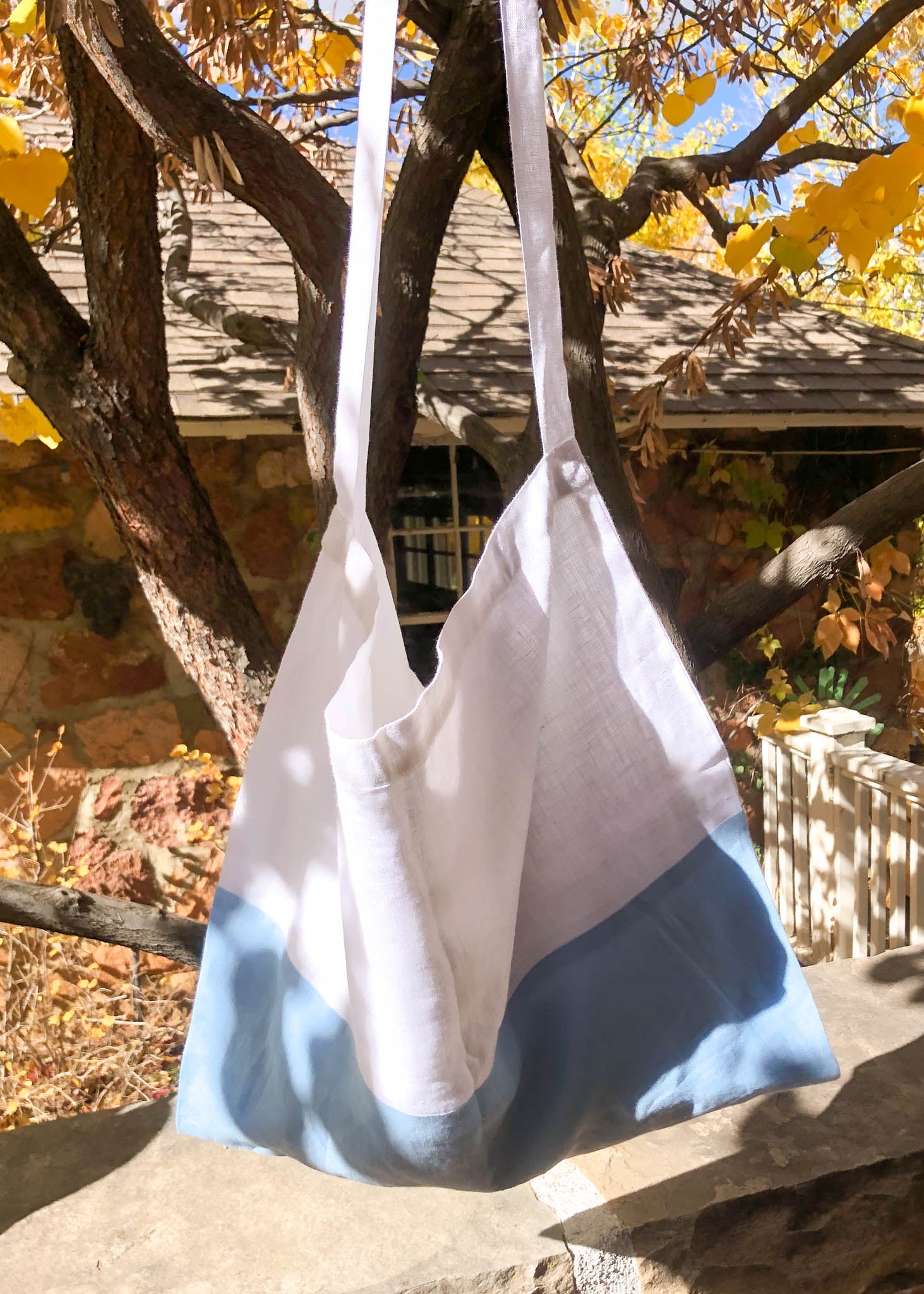 Farmers Market Bag in White & Sky Linen, showcasing its color block design and organic fabric.