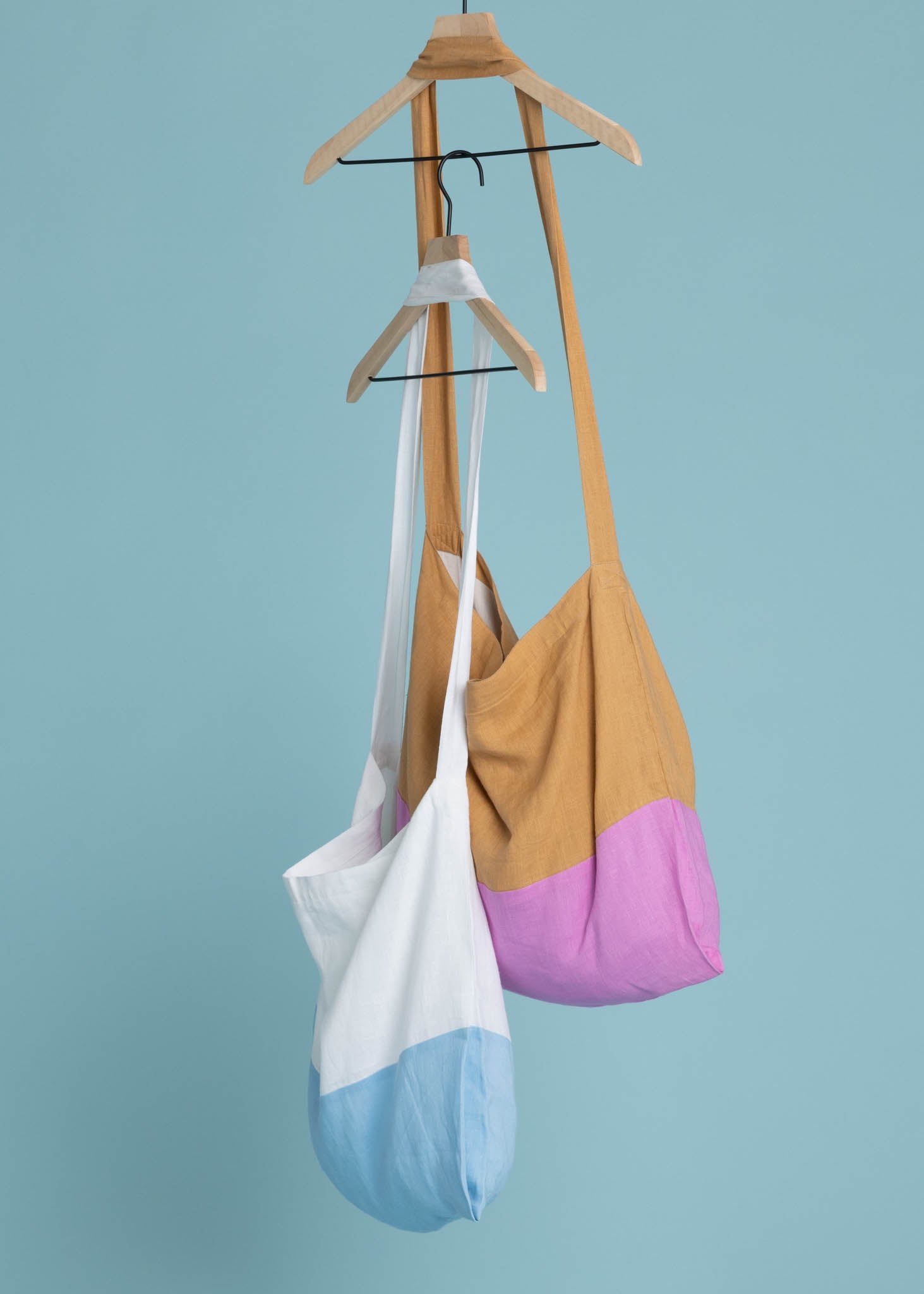 Farmers Market Bag in White & Sky Linen, showcasing its color block design and organic fabric.