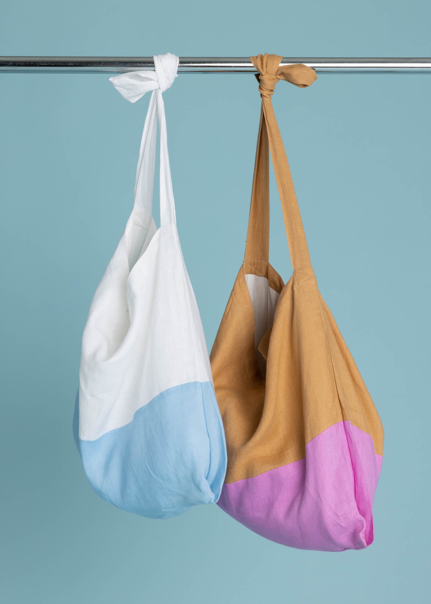 Farmers Market Bag in White & Sky Linen, showcasing its color block design and organic fabric.