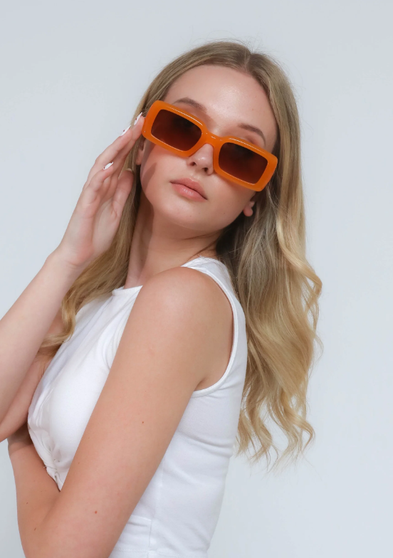 Stylish orange fashion sunglasses with scratch-resistant lenses and UV400 protection.